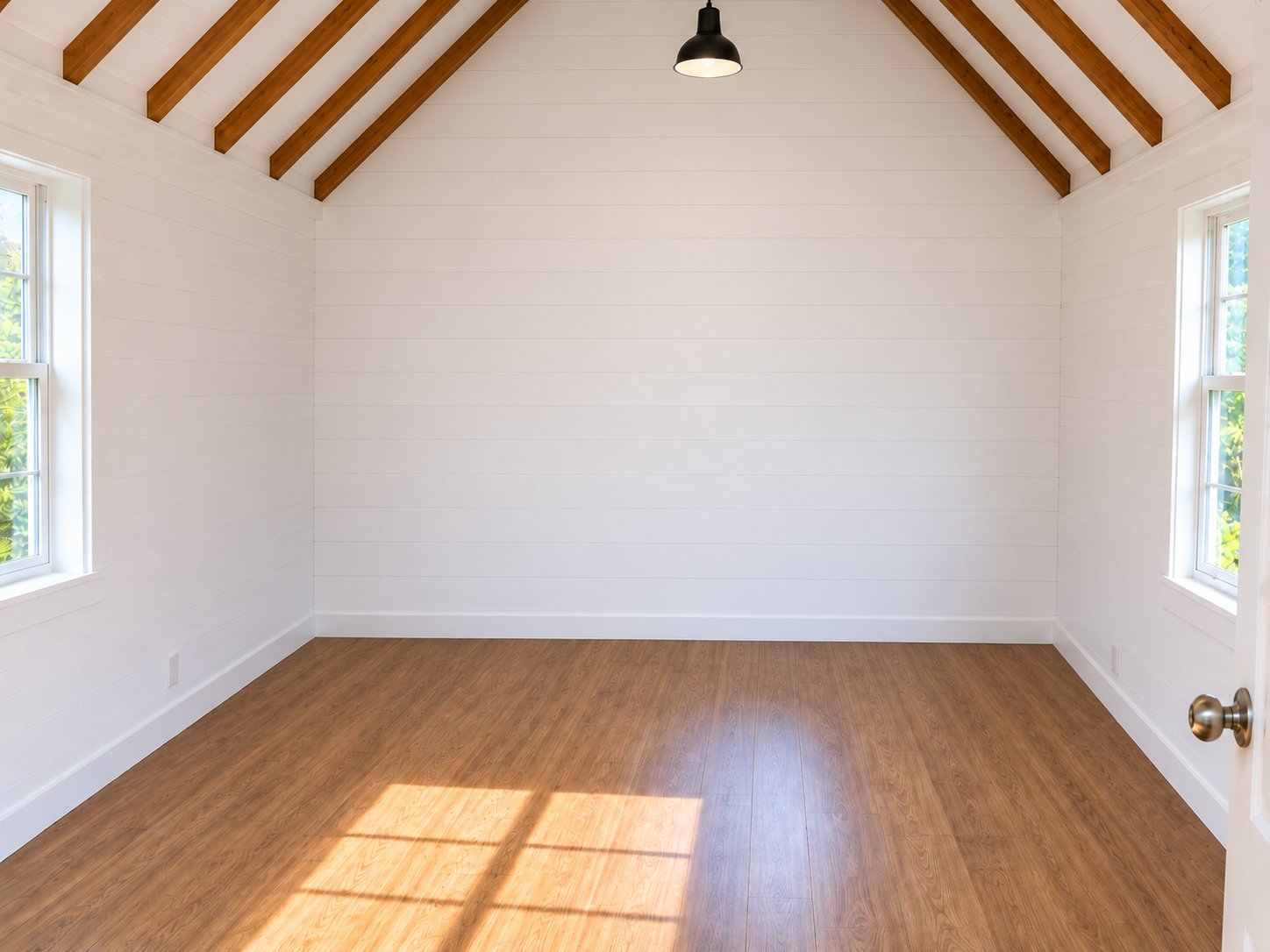 Real finished room with LVP flooring, no bathroom fixtures yet