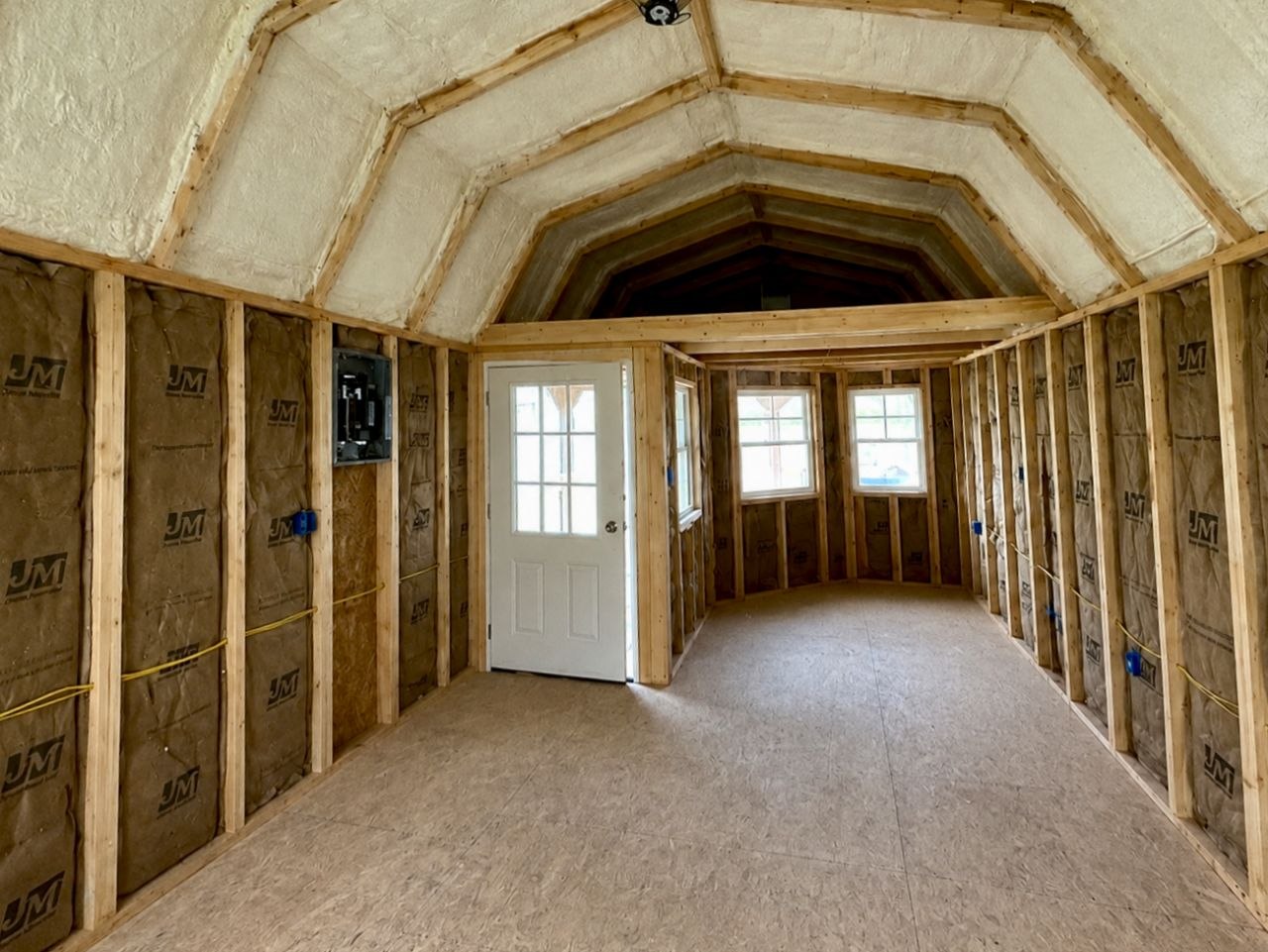 Real unfinished framing, facing the front door and kitchen area